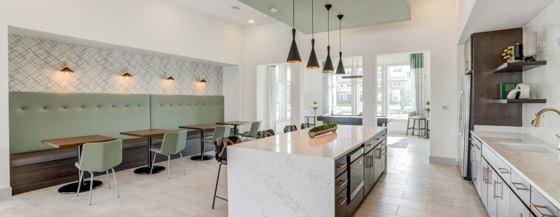 a kitchen with a marble island
